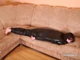 [From archive] Pti4ka mummified in black cling film