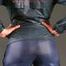 Alina posing in a studio wearing a supersexy darkblue rainwear combination (Pics)