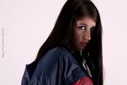 Shelly bound and gagged in shiny nylon rainwear