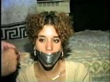 LATINA MARIA, BOUND, HANDGAGGED, TAPE-GAGGED, BALL-GAGGED HOSTAGE (D22-16)