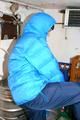 Jill tied and gagged in a refrigeration room wearing a blue shiny nylon down jacket and a black rain pants (Pics)
