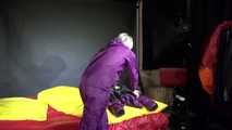 Watching sexy Sonja weraing a sexy down skirt and a down jacket putting on a sexy purple rainsuit (Video)