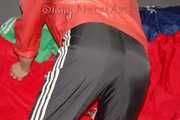 SONJA wearing a very special red shiny nylon jacket and a black shiny nylon pant sorting shiny nylon shorts (Pics)