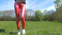 Red leggings on a green meadow