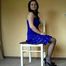 Sunny cuffed on a chair