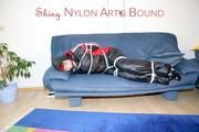 Jill tied and gagged wearing shiny nylon oldschool downwear (Pics)