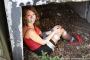 Susanne tied up with tape PICS
