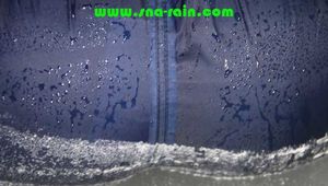 SEXY SONJA wearing a sexy shiny nylon rainwear combination having fun in the bathtub and in the shower (Pics)