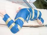 Beautiful archive girl in a blue shiny nylon rainsuit tied and gagged with tape on a sunlounger (Pics)