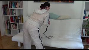 Jill ties, gagges and hoodes herself wearing white shiny nylon rainwear (Video)