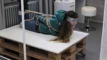 Poor Rey got catched by a mean couple which heavily tied and gagged her in her new shiny Down jacket. They stored her on a rolling table and gave her some bad news before Rey got tickeled, laughing in her pantygag.