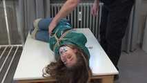 Poor Rey got catched by a mean couple which heavily tied and gagged her in her new shiny Down jacket. They stored her on a rolling table and gave her some bad news before Rey got tickeled, laughing in her pantygag.
