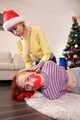 Merida and Hannah - Merida overpowered and hogtied by Hannah under the Christmas tree