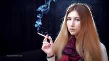 Mysterious girl Valya poses on camera with a tasty 120mm cigarette