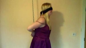 Miri is cuffed up and blindfolded