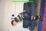 Get 548 Pictures with Jill tied and gagged in shiny nylon rainwear from 2005-2008!