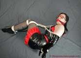 Bound in sexy PVC minidress and PVC gloves