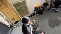 Alice taped to a Chair and tapegagged in shiny nylon Downjacket