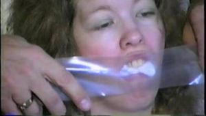 25 YR OLD CHARLENE IS CLEAR PLASTIC GAGGED, BALL-TIED, HOG-TIED, BLINDFOLDED, TAPE GAGGED & TIED TO AN EXERCISE MACHINE IN HER ATTIC (D54-6)