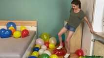 stomp2pop the balloons with her clogs shoes