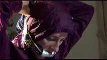 Get 2 Archivevideos with sonja enjoying Bondage in her shiny nylon Rainwear