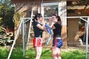 Jill tied and gagged by her friend in shiny nylon shorts