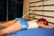 Marlin tied and gagged in shiny blue shorts