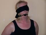 Tied and gagged on a chair