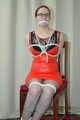 Gefesselt im Wetlook Outfit und verschiedene Knebel