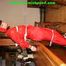 Get 548 Pictures with Jill tied and gagged in shiny nylon rainwear from 2005-2008!