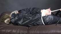 Watching Pia being tied and gagged with ropes and a clothgag wearing sex black shiny nylon suit (Video)