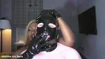 Huge rubber hands in the gimp’s mouth
