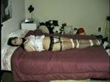 19 Yr OLD LATINA HOUSEWIFE WASHCLOTH MOUTH STUFFED, ACE BANDAGE WRAP GAGGED, BALL-GAGGED & HOG-TIED ON BED (D43-8)