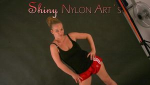 Jenny and Yvonne having a good time together and making fotos from eachother wearing sexy shiny nylon shorts and tops (Pics)