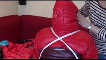 Jill tied, gagged and hooded on a chair wearing two downjackets for breath control play (Video)