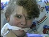 22 Yr OLD LISA IS RUBBER BAND BALL-GAGGED, MOUTH STUFFED, HANDGAGGED, OTM & CLEAVE GAGGED (D43-6)