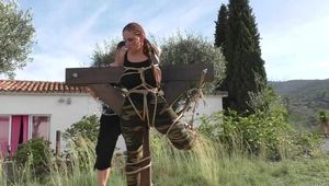 Bettine on the Bondage Cross