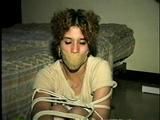 WRAP AROUND TAPE GAGGED & TOE TIED LATINA (D15-10)