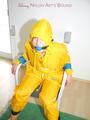 Katharina tied, gagged and hooded on a chair wearing sexy yellow rainwear (Pics)