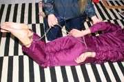 Watching sexy Alina being tied and gagged on the floor from Katharina both wearing sexy shiny nylon rainwear combinations (Pics)