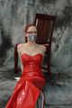 Bound in red PVC dress