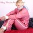 Pia tied and gagged in a beautiful rose shiny nylon rainsuit in bed (Pics)