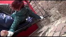 Mara tied and gagged on a princess bed in an old cellar wearing an supersexy shiny green down jacket and a rain pants (Video)