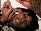 BLACK FEISTY & CUTE SARAH IS TAPE GAGGED, MOUTH STUFFED, TIED WITH RAWHIDE & TIGHTLY HANDGAGGED (D53-16)