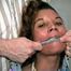 28 YR OLD MOM GETS MOUTH STUFFED WITH SPONGE, CLEAVE GAGGED,  HANDGAGGED, ROPE GAGGED, TIT TIED BAREFOOT, & TOE-TIED (D62-9)
