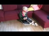 03:00 Video with Nina tied and gagged in black rainpants and a green cagoule