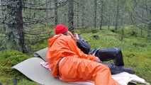Rainwear sex in the forest