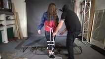 Marie bound and gagged in shiny nylon Rainwear