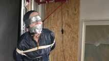 Rachel Adams bound and pantygagged in shiny nylon Rainwear