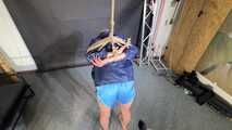 Lena buttplugged, bound and gagged in shiny Shorts and Windbreaker